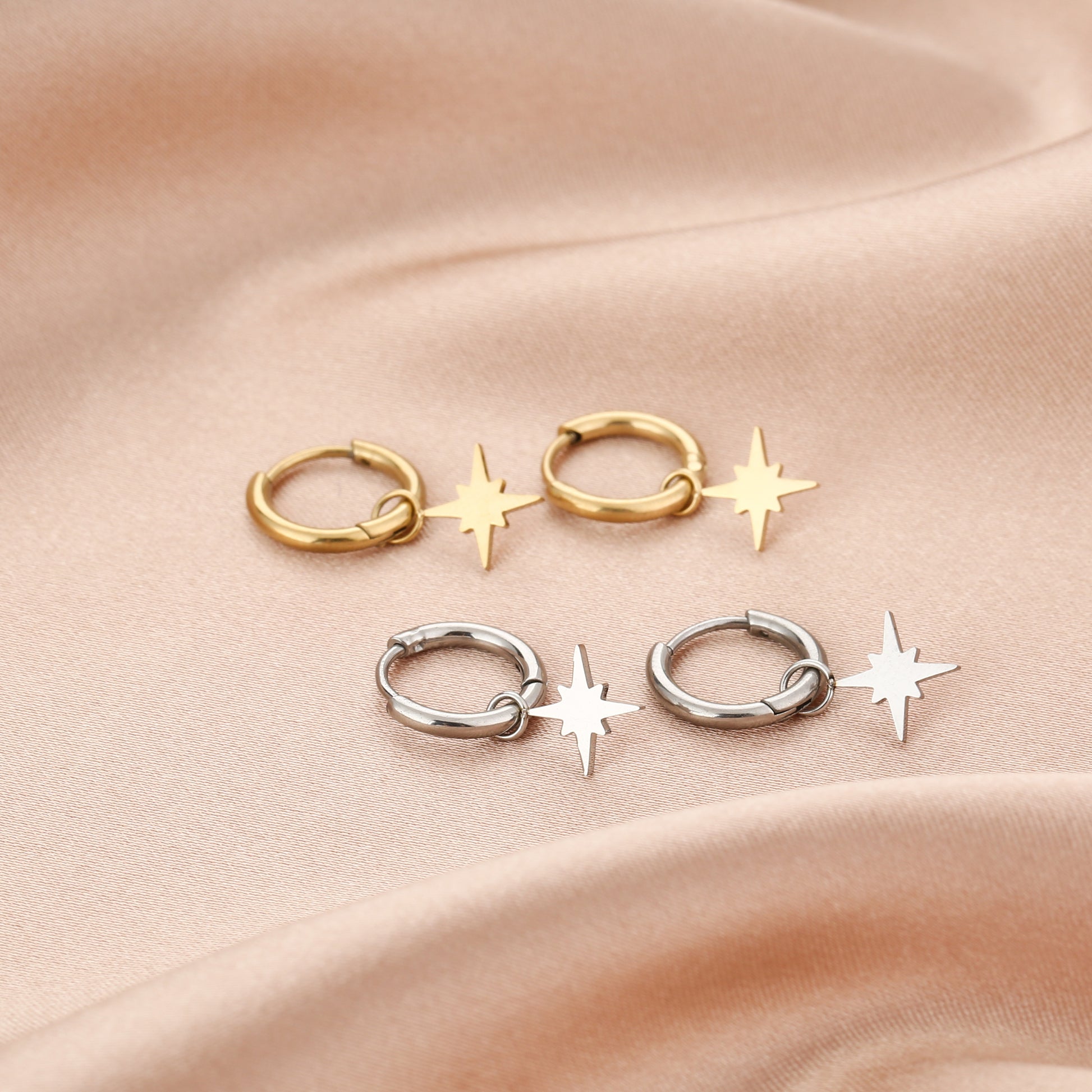 Creool oorbellen met ster goud en zilver kleur