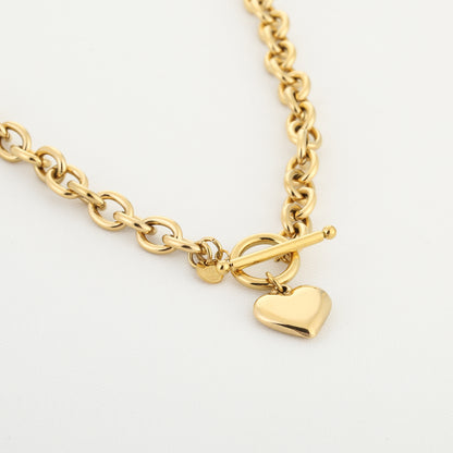 Riva goudkleurige schakel ketting met hartbedel stainless steel detailfoto